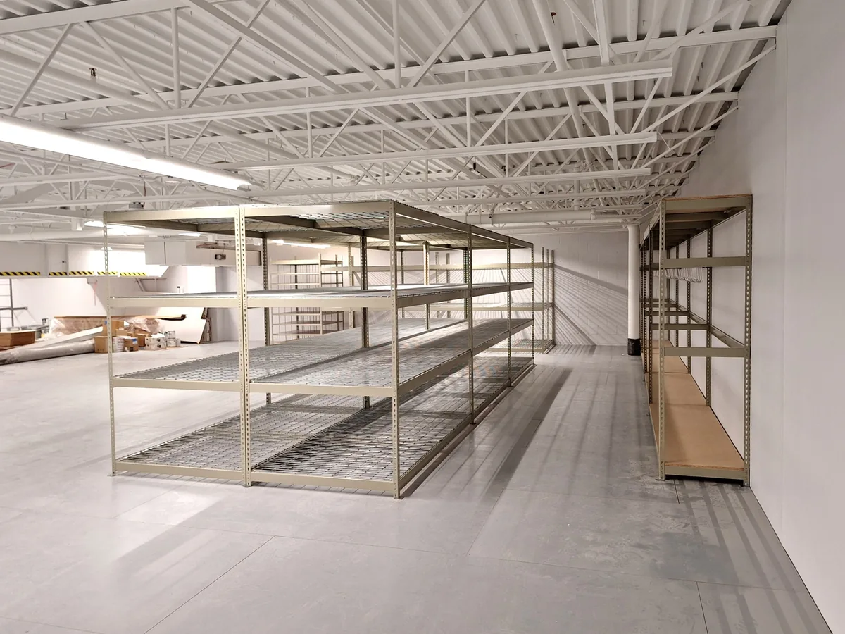 Open rivet rack shelving layout for hand-loaded storage