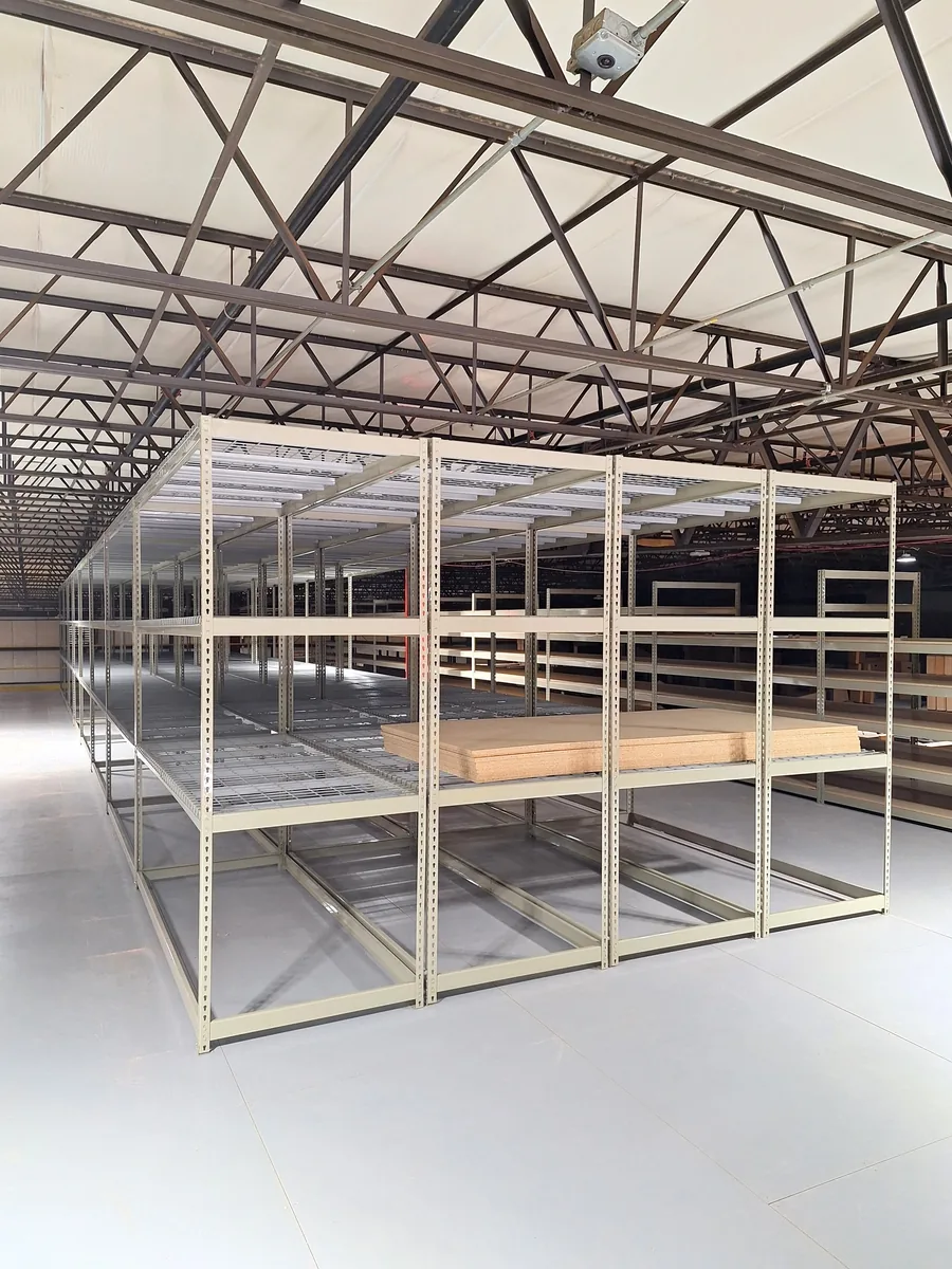 Rivet rack shelving bay for hand-loaded inventory